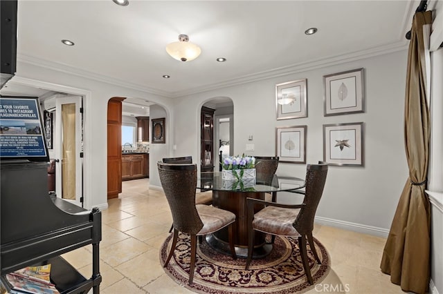 150 Cress St, Laguna Beach, CA 92651 - dining area featuring ornamental molding, baseboards, recessed lighting, and arched walkways