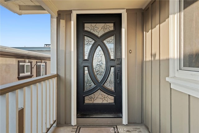 150 Cress St, Laguna Beach, CA 92651 - doorway to property featuring board and batten siding