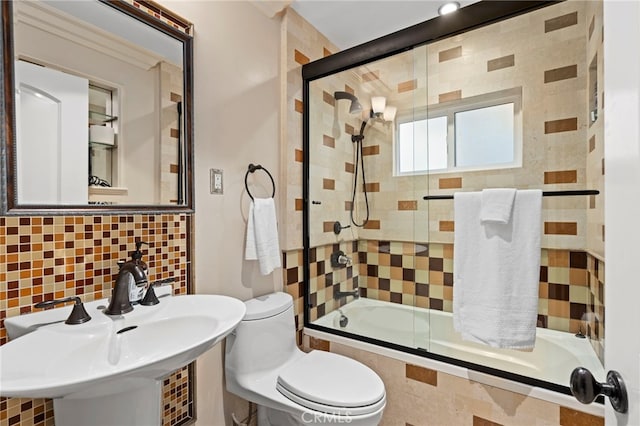 150 Cress St, Laguna Beach, CA 92651 - full bathroom with toilet, tiled shower / bath, a sink, and backsplash