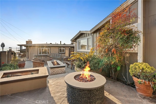 150 Cress St, Laguna Beach, CA 92651 - view of patio / terrace with an outdoor fire pit