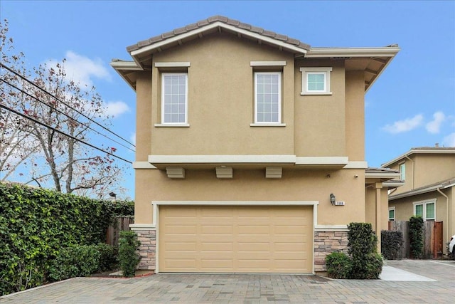 front of property with a garage