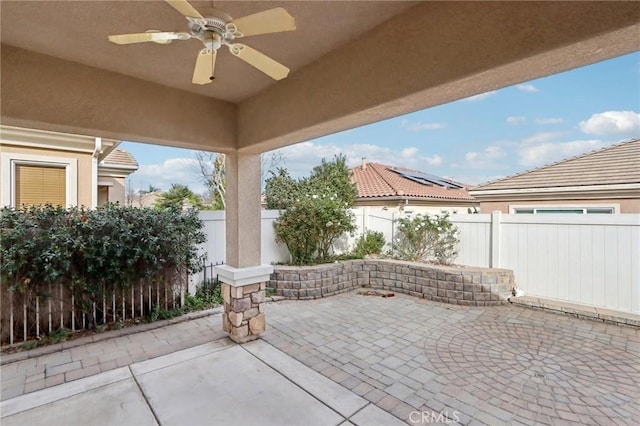 view of patio with ceiling fan