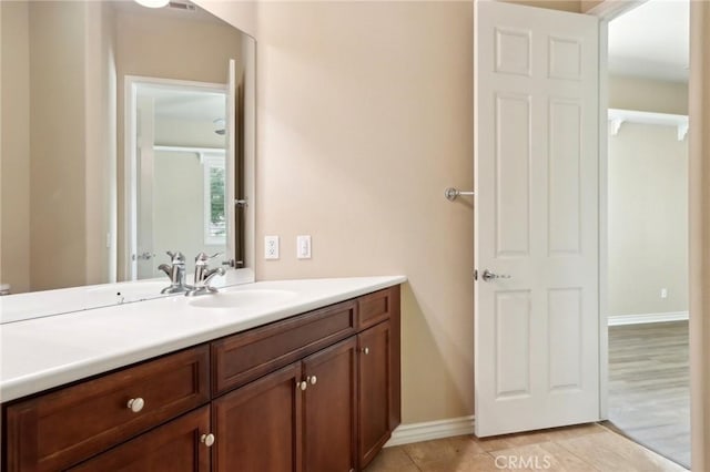 bathroom with vanity and tile patterned flooring