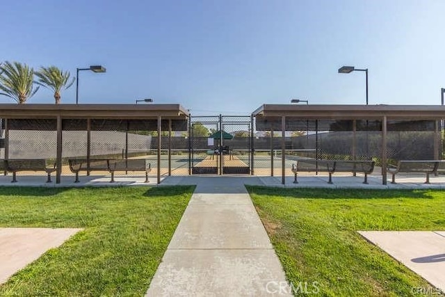 view of home's community featuring a yard