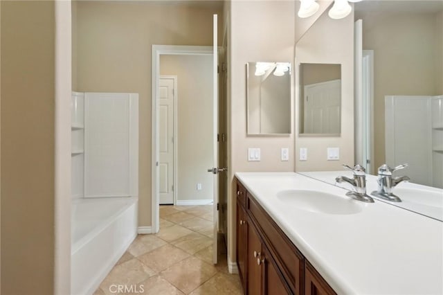 bathroom with tile patterned flooring and vanity