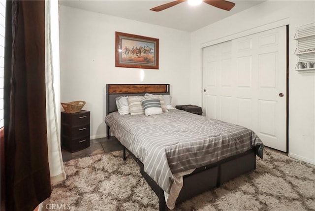 bedroom with a closet and ceiling fan