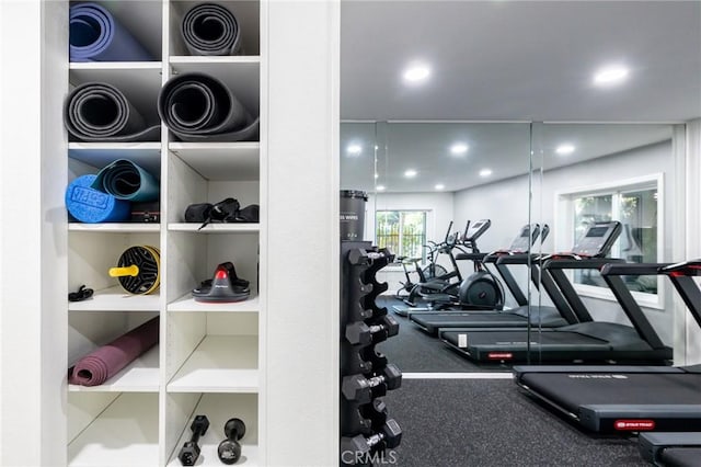 gym with recessed lighting