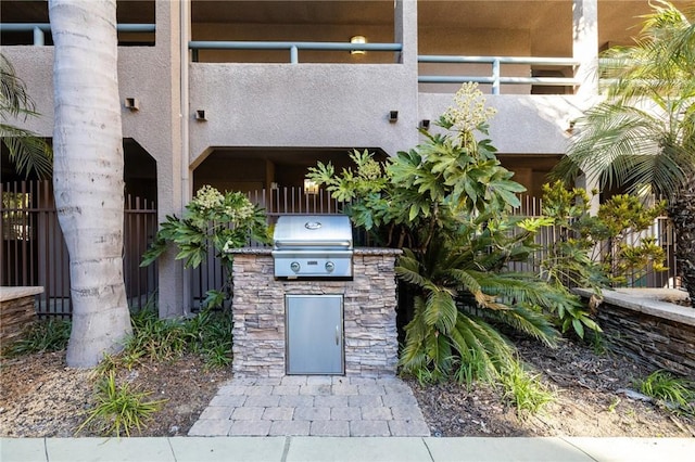 view of patio / terrace featuring fence and area for grilling