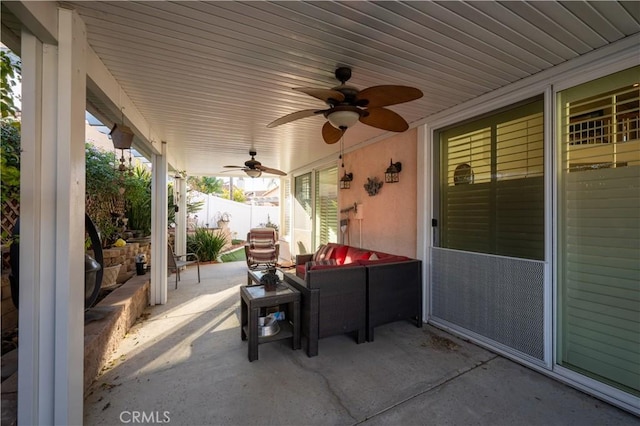 view of patio featuring outdoor lounge area and ceiling fan