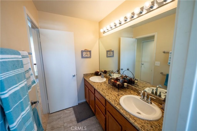 bathroom featuring vanity and tile patterned floors