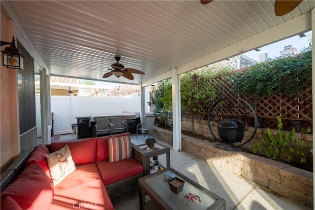 view of patio / terrace featuring ceiling fan and outdoor lounge area