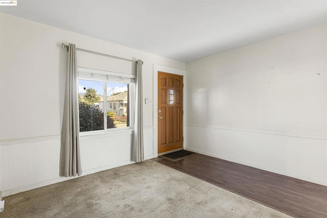 view of carpeted foyer