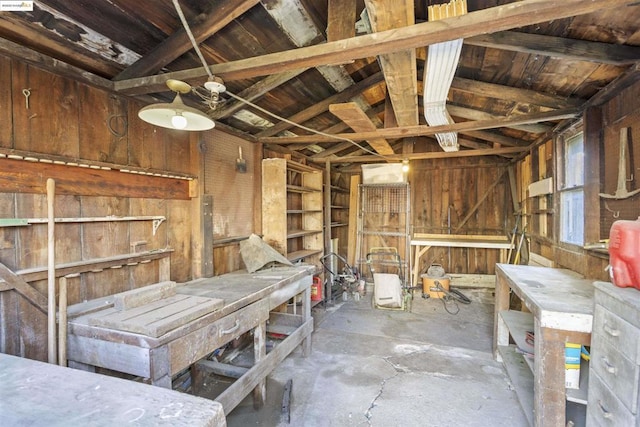 miscellaneous room with wood walls, wooden ceiling, and lofted ceiling