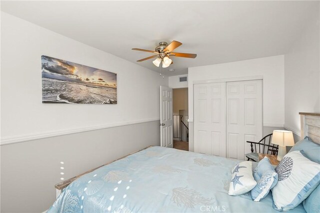 bedroom with a closet and ceiling fan