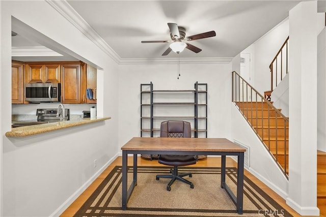 home office with ceiling fan, dark wood-type flooring, and crown molding