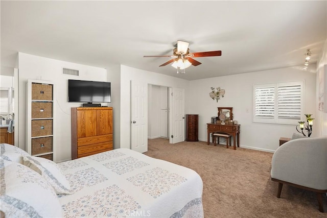 carpeted bedroom featuring ceiling fan