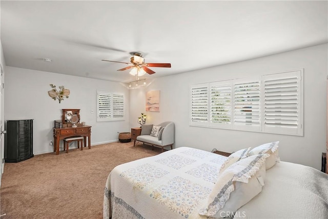 bedroom featuring ceiling fan and carpet flooring