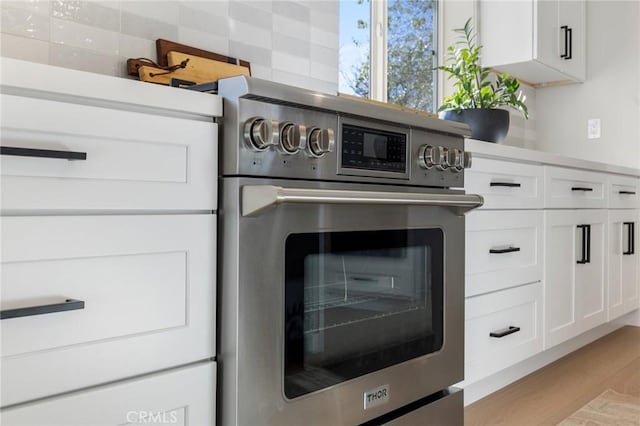 room details with wall oven and white cabinets