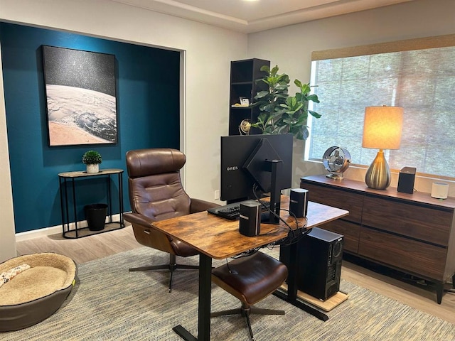 office area with light wood-type flooring