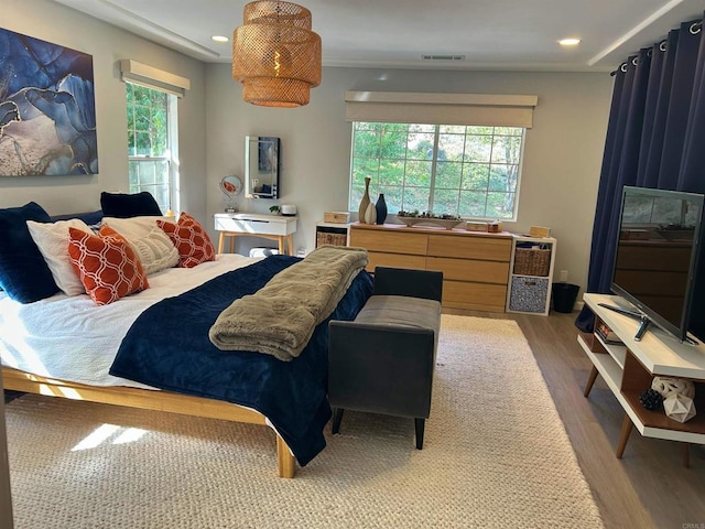 bedroom featuring hardwood / wood-style flooring