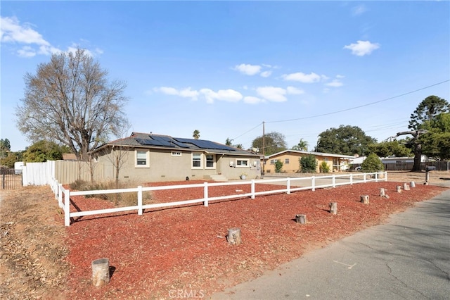 exterior space with solar panels