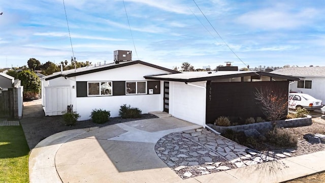 view of front of home featuring cooling unit