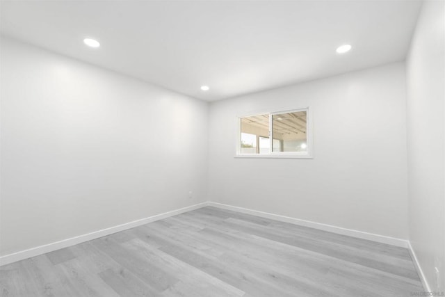 unfurnished room featuring light wood-type flooring