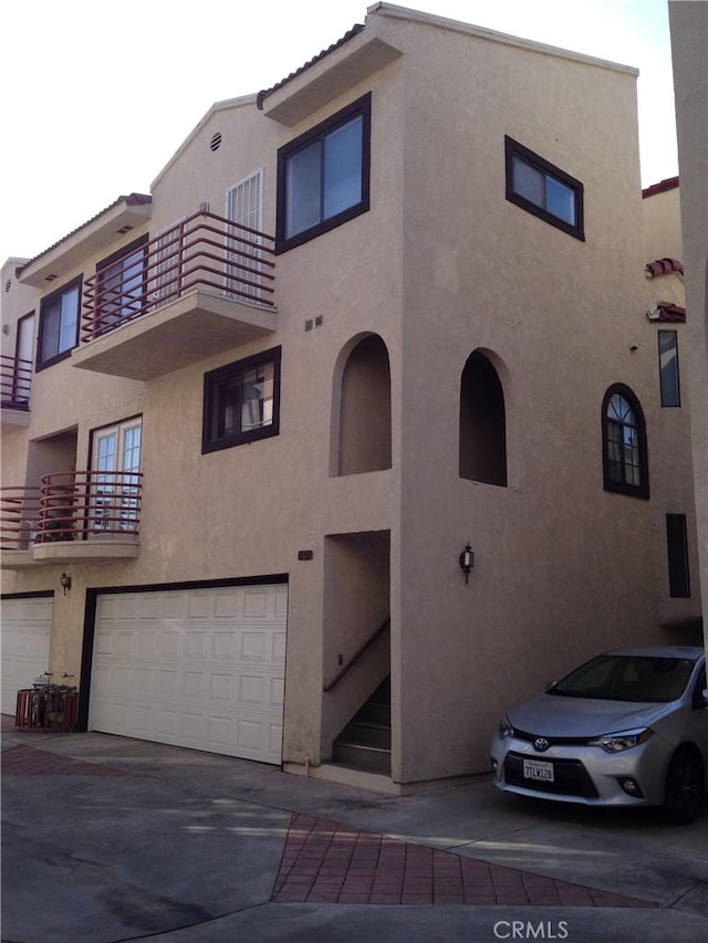 view of building exterior featuring a garage