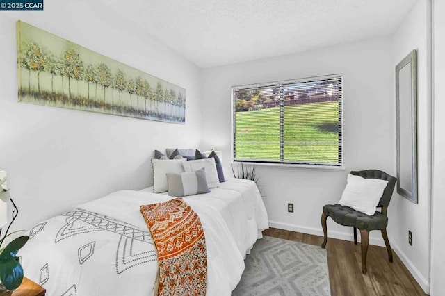 bedroom featuring hardwood / wood-style floors