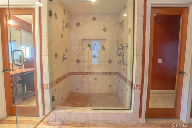 bathroom featuring an enclosed shower