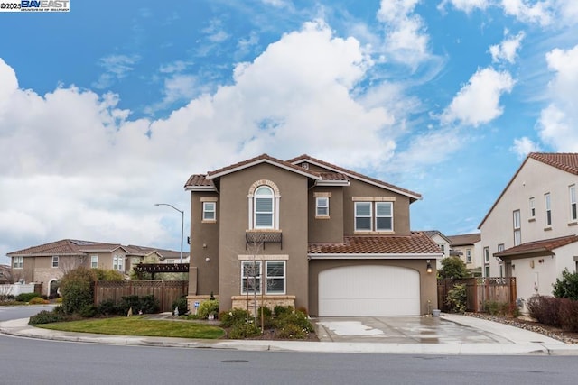 view of front of home with a garage