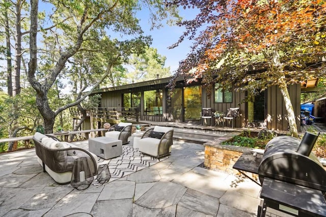 view of patio featuring a grill