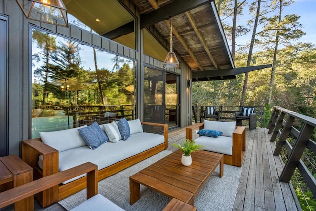 sunroom featuring lofted ceiling