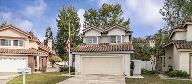 front facade with a garage and a front yard