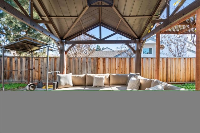 view of patio featuring an outdoor living space and a gazebo