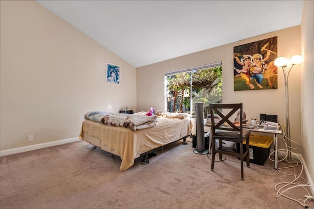 carpeted bedroom featuring vaulted ceiling