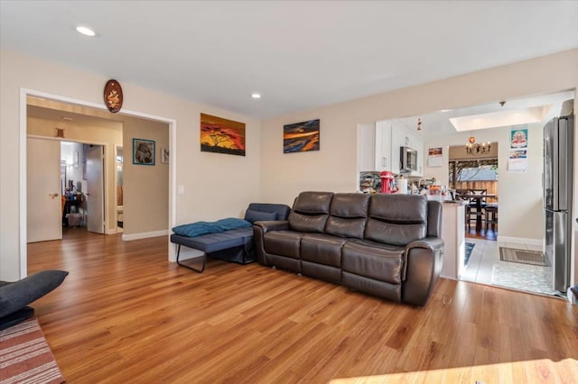 living room with light hardwood / wood-style floors