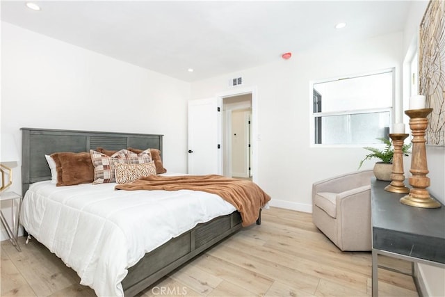 bedroom featuring light hardwood / wood-style flooring