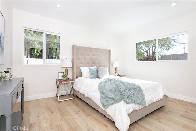 bedroom featuring light hardwood / wood-style floors