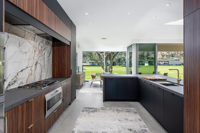 view of patio / terrace with sink and an outdoor kitchen