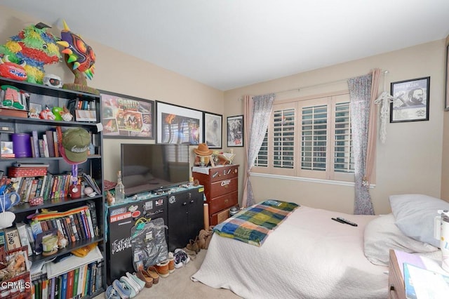 bedroom featuring carpet flooring