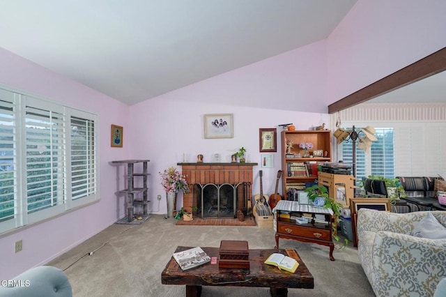 carpeted living room with a fireplace and vaulted ceiling