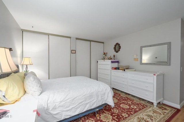 2209 Aspenpark Ct, Thousand Oaks, CA 91362 - bedroom with two closets and light wood finished floors