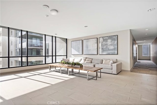 unfurnished living room with light tile patterned floors