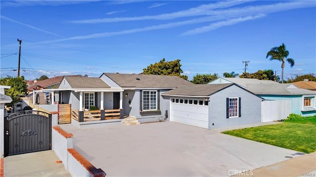 ranch-style house with a garage and a front lawn