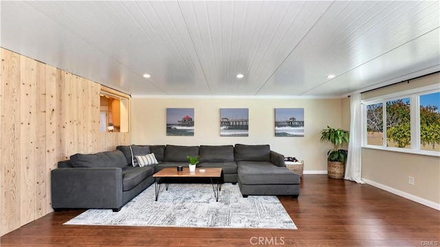 living room with wooden ceiling, crown molding, and dark hardwood / wood-style flooring