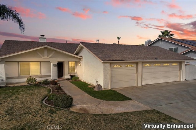 view of front of home with a garage