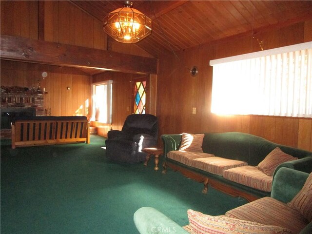 2440 Spruce Dr, Arrowbear, CA 92382 - carpeted living area with wooden walls and vaulted ceiling