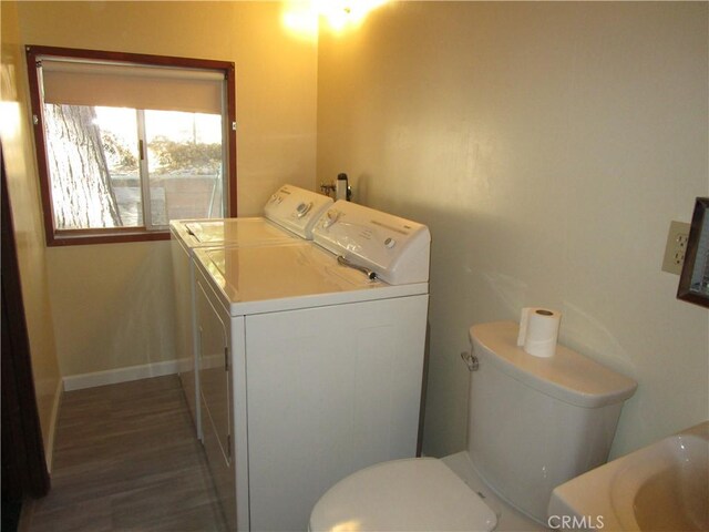 2440 Spruce Dr, Arrowbear, CA 92382 - laundry area featuring washing machine and clothes dryer and wood finished floors