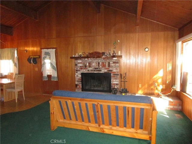 2440 Spruce Dr, Arrowbear, CA 92382 - living room with wooden walls, carpet, a brick fireplace, and wood ceiling